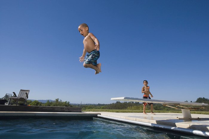 A diver leaves the end of a 4.0-m-high diving board